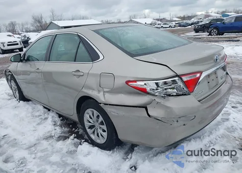 2015 Toyota Camry Hybrid Le from USA, damaged, VIN 4T1BD1FKXFU141795